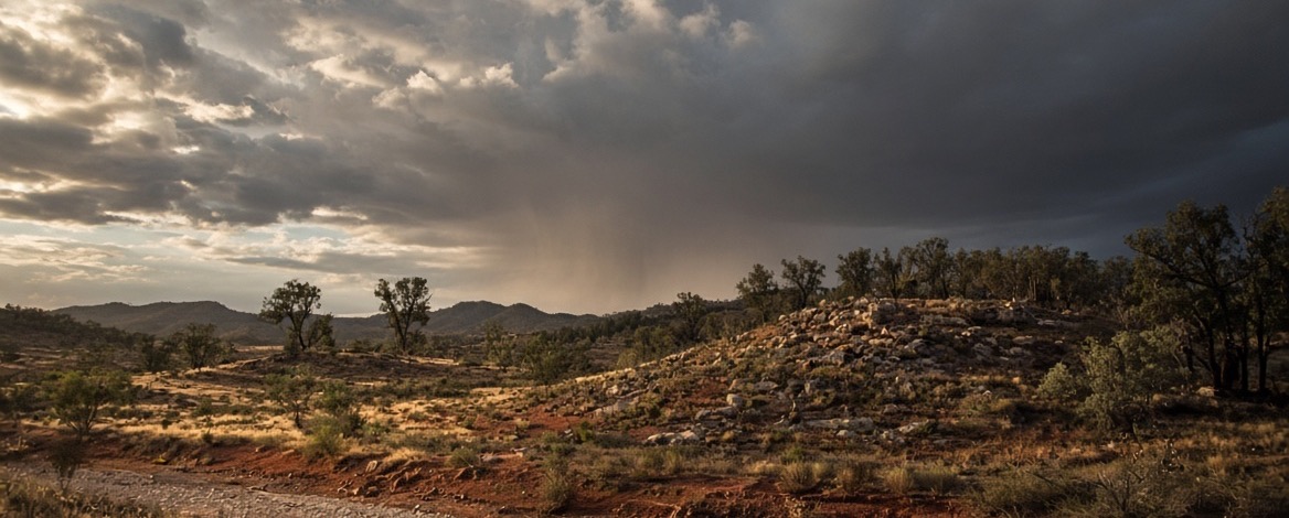 Storm and rain over the outback at dusk